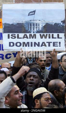 A group organized by a Muslim leader protests cartoons published by a ...