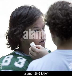 Actor Mark Wahlberg plays a game of catch with other cast members on the  set of the Disney movie Invincible in Philadelphia Monday, Aug. 15, 2005.  Wahlberg stars in the movie as