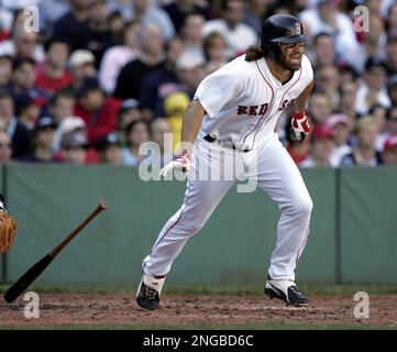 Boston Red Sox's outfielder Johnny Damon, still doing a black eye, turns up  for practice despite sitting out game two of the American League  championship series playoffs against the New York Yankees