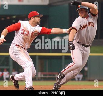 Cincinnati Reds' Sean Casey fields a ball hit by Florida Marlins