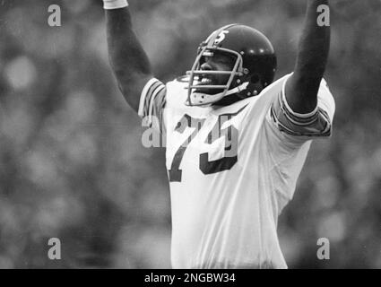 Pittsburgh Steelers' tackle Mean Joe Greene encourages his teammates  during the Super Bowl game against the Minnesota Vikings in Tulane Stadium  in New Orleans, Jan. 13, 1975. The Steelers won, 16-6. (AP