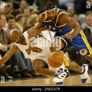 Los Angeles Lakers' Caron Butler dunks during the first half against the  Golden State Warriors, Friday night, Dec. 3, 2004, in Los Angeles. (AP  Photo/Mark J. Terrill Stock Photo - Alamy