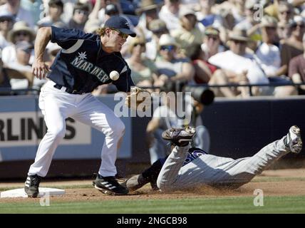 Seattle Mariners' Scott Spiezio steals second as Anaheim Angels