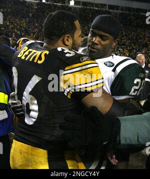 FILE - In this Dec. 26, 2004 file phot, Pittsburgh Steelers' Jerome Bettis  (36) is hauled down from behind by Baltimore Ravens linebacker Terrell  Suggs (55) after a gain of eight yards