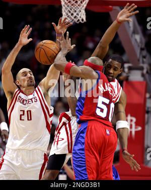 Houston Rockets' Tracy McGrady, Jon Barry and Yao Ming celebrate after ...