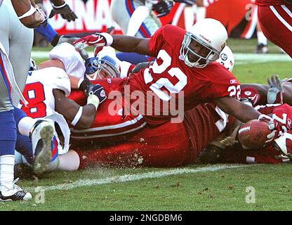 Arizona Cardinals running back Emmitt Smith makes a sharp cut against the  New York Jets. Smith was injured in the first half. The Jets defeated the  Cardinals 13-3 Nov. 28, 2004 in