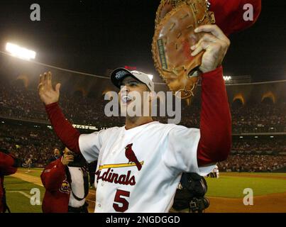 St. Louis Cardinals Albert Pujols celebrates his teams 5-2 victory over the  Houston Astros in game seven to win the National League Championsip Series  at Busch Stadium in St. Louis on October