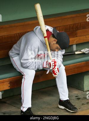 Boston Red Sox shortstop Orlando Cabrera, right, leaps after