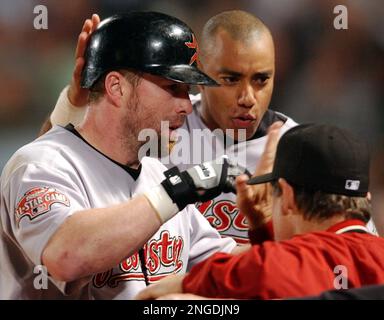 Former Houston Astros' Jeff Bagwell, left, and his girlfriend Rachel Brown,  right, in the second quarter of an NFL football game between the Houston  Texans and Atlanta Falcons Sunday, Dec. 4, 2011