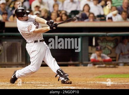 Houston Astros' Craig Biggio swings for an RBI single in the fourth inning  against the Cincinnati Reds on Saturday, May 1, 2004, in Houston. (AP  Photo/Pat Sullivan Stock Photo - Alamy