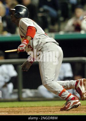 St. Louis Cardinals Edgar Renteria swings for a single and a five for five  day against the New York Mets in the eighth inning at Busch Stadium in St.  Louis on August 8, 2004. (UPI Photo/Bill Greenblatt Stock Photo - Alamy