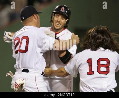 Boston Red Sox's Mark Bellhorn (12) tags out Chicago Cubs' Aramis Ramirez  (16) after he tried to strech a single into a double. The Chicago Cubs  defeated the Boston Red Sox 14-6