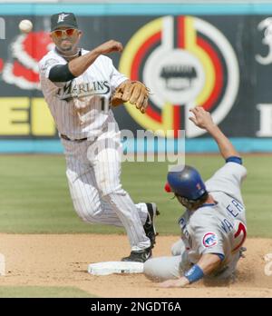 The Florida Marlins celebrate victory,waiting for Alex Gonzalez to get to  home, after hitting a walk off home run in the 12th inning against the New  York Yankees in game 4 of