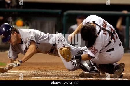 Houston Astros catcher Brad Ausmus returns to the dugout to go to bat  against the Washington Nationals at Osceola County Stadium in Kissimmee,  Florida, on March 7, 2007. (UPI Photo/Ed Wolfstein Stock