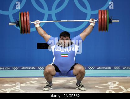 Hossein Reza Zadeh of Iran lifts 441 pounds 200 kg in the snatch during the men s over 231 lb 105 kg event at the Nikaia Olympic Weightlifting Hall during the 2004 Summer