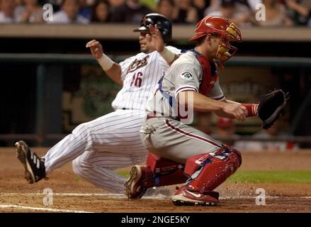 The Philadelphia Phillies Mike Lieberthal (24) comes in to score and is  congratulated by Philadelphia Phillies Pat Burrell after hitting a two run  home run in the fourth inning against the Washington Nationals Tony Armas  on August 29, 2006 at RFK Stadi