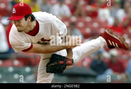 St. Louis Cardinals catcher Mike Matheny, left, and starting pitcher Chris  Carpenter (29) confer on the mound in the fourth inning against the Arizona  Diamondbacks, Saturday, Sept. 18, 2004, in St. Louis.