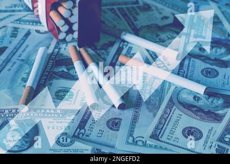 Concept of smoking cost. Cigaretes on a dollars background. Stock Photo