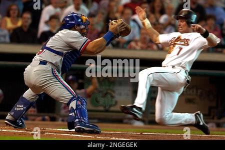 Texas Rangers' Lance Berkman, left, and Houston Astros' Brett Wallace visit  in a baseball game Sunday, March 31, 2013, in Houston. (AP Photo/Pat  Sullivan Stock Photo - Alamy