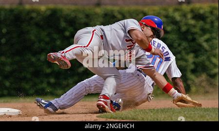 Chicago Cubs, Corey Patterson, back, steals second base as