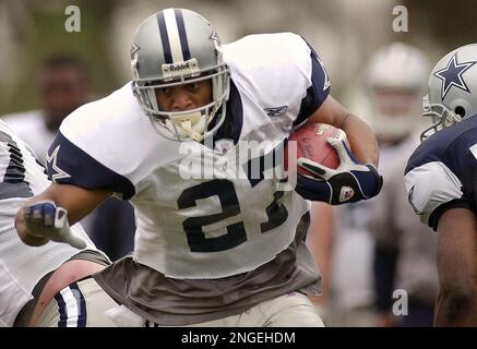 Dallas running back Eddie George escapes the grasp of a Detroit defender  during Cowboys-Lions game Oct. 31 in Irving, TX. The Cowboys defeated the  Lions 31-21. (UPI Photo/Ian Halperin Stock Photo 