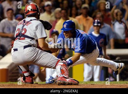 St. Louis Cardinals catcher Mike Matheny, left, and starting pitcher Chris  Carpenter (29) confer on the mound in the fourth inning against the Arizona  Diamondbacks, Saturday, Sept. 18, 2004, in St. Louis.