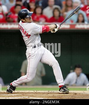 Boston Red Sox's Nomar Garciaparra grimaces as he tosses his bat after  hitting a popup in the first inning against the Toledo Mud Hens, Friday,  June 4, 2004, in Toledo, Ohio. Garciaparra