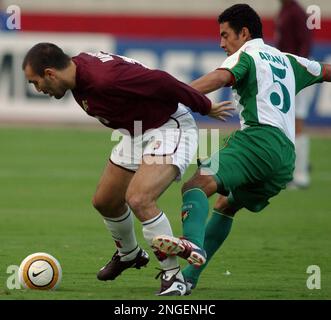 Bolivia's Ronald Arana, right, and Venezuela's Massimo Margiota