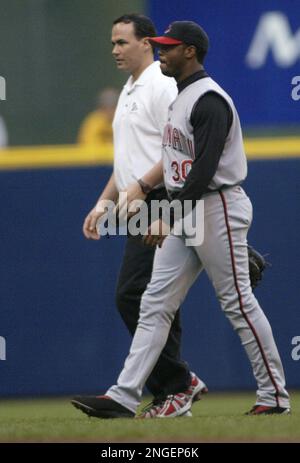 Cincinnatti Reds' Ken Griffey, Jr. can't catch the ball hit by