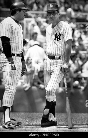 Reggie Jackson, manager Billy Martin and Graig Nettles of the New York  Yankees are all smiles on the way to the dugout after beating the Chicago  White Sox 7-6 in 11 innings