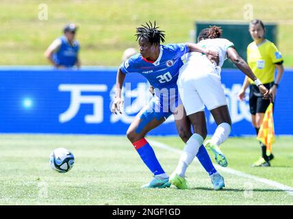 Auckland, New Zealand. 18th Feb, 2023. Kethna Louis (L) of Haiti competes during a play-off tournament match between Senegal and Haiti of the FIFA Women's World Cup Australia and New Zealand 2023 (FWWC 2023) at the North Harbour Stadium in Auckland, New Zealand, Feb. 18, 2023. Credit: Guo Lei/Xinhua/Alamy Live News Stock Photo