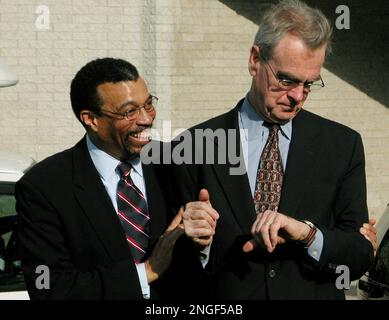 Jayson Williams defense team members, from left, attorney Billy Martin,  spokeswoman Judy Smith and attorney Joseph A. Hayden Jr. walk arm in arm  from the Somerset County Courthouse in Somerville, N.J., following