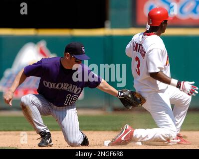 St. Louis Cardinals Edgar Renteria slides safely into home in front of  Pittsburgh Pirates catcher Humberto Coda in the first inning at Busch  Stadium in St. Louis on May 27, 2004. Renteria