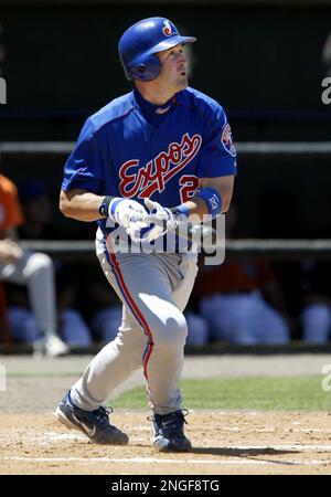 Catcher Brian Schneider of the Montreal Expos stands with pitcher