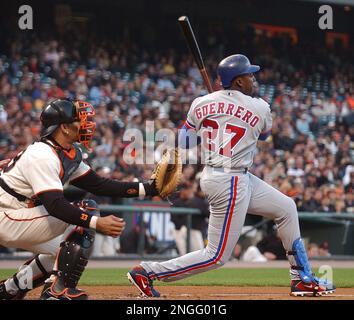 Montreal Expos Vladimir Guerrero (27) celebrates with teammate Brian  Schneider after hitting a three-run home run off San Diego Padres pitcher  Jaret Wright to beat the Padres 12-9 in 10 innings, in