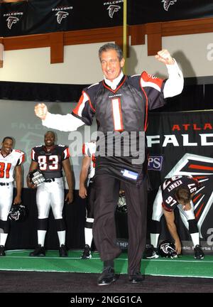 Atlanta Falcons owner Arthur Blank models a new Falcons' jersey