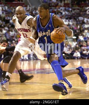 Orlando Magic's Tracy McGrady drives past Atlanta Hawks' Boris Diaw, of  France, in the first quarter of a preseason game in Orlando, Fla.  Wednesday, Oct. 22, 2003.(AP Photo/Peter Cosgrove Stock Photo 