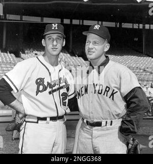 Warren Spahn, left-handed pitcher for the Milwaukee Braves, left, and  Edward Whitey Ford of the New York Yankees, are seen together in Milwaukee,  Wisc., on September 30, 1958. The two starting pitchers