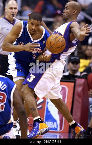 Los Angeles Clippers' Jeff McInnis (5) celebrates his game-winning basket  at the buzzer as Phoenix Suns' Stephon Marbury, right, watches Friday,  March 29, 2002, in Phoenix. The Clippers won 96-94. (AP Photo/Matt