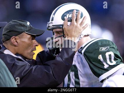 New York Jets coach Herman Edwards (L) acknowledges Head coach