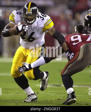 FILE - In this Dec. 26, 2004 file phot, Pittsburgh Steelers' Jerome Bettis  (36) is hauled down from behind by Baltimore Ravens linebacker Terrell  Suggs (55) after a gain of eight yards