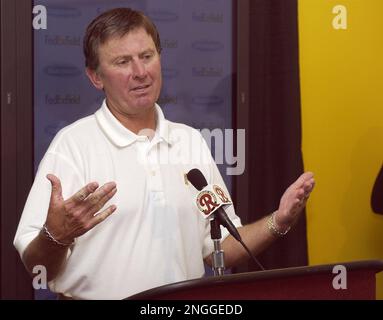 Washington Redskins head coach Steve Spurrier chats with wide receiver  Darnerien McCants in the final practice shortly before the kickoff of the  NFL preseason match American Bowl against the San Francisco 49ers