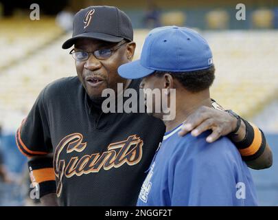 ftSan Francisco Giants manager Dusty Baker, left, gets together with Los  Angeles Dodgers hitting coach Manny Mota before the start of their four  game series at Dodger Stadium, Sept. 16, 2002, in Los Angeles. (AP  Photo/Kevork Djansezian Stock Photo