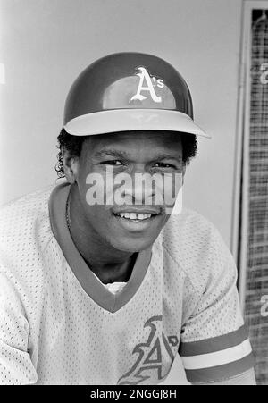 Oakland A's Rickey Henderson (35) dives head on into first base to avoid a  pickoff in the first inning at Oakland, Oct. 15, 1981, in the third game of  the American League