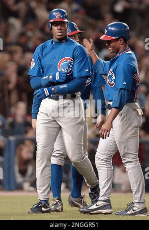 Chicago Cubs' Fred McGriff, left, is congratulated by Corey Patterson after  hitting a three-run home run during the seventh inning against the Los  Angeles Dodgers, Friday night, May 3, 2002, in Los