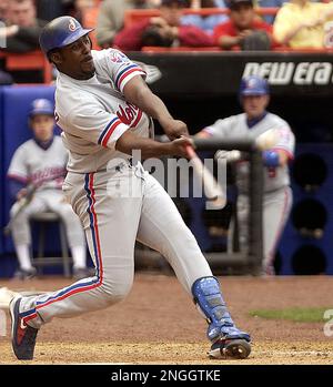 Montreal Expos' Vladimir Guerrero hits a two-run home run off St. Louis  Cardinals pitcher Larry Luebbers to extend his hitting streak to 30 games  in Montreal Wednesday, August 25, 1999. (AP PHOTO/Ryan