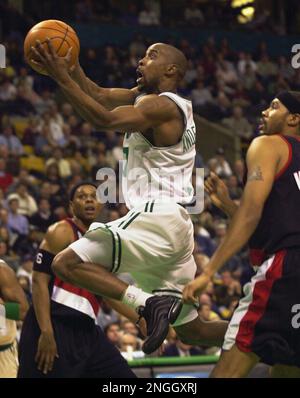 New Jersey Nets' Stephon Marbury (33) drives toward Boston Celtics' Kenny  Anderson (7) and Vitaly Potapenko, left, during the first quarter Friday,  Feb. 4, 2000, in Boston. (AP Photo/Lisa Poole Stock Photo - Alamy