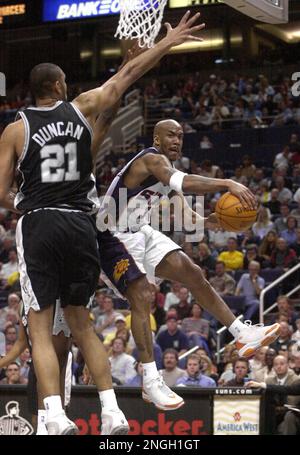Los Angeles Clippers' Jeff McInnis (5) celebrates his game-winning basket  at the buzzer as Phoenix Suns' Stephon Marbury, right, watches Friday,  March 29, 2002, in Phoenix. The Clippers won 96-94. (AP Photo/Matt