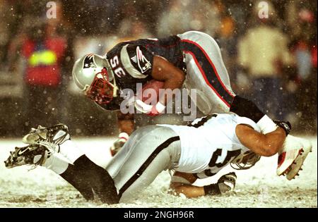 https://l450v.alamy.com/450v/2ngh96r/new-england-patriots-fullback-patrick-pass-35-is-tackled-by-oakland-raiders-eric-barton-during-the-second-quarter-of-the-afc-divisional-playoff-game-at-foxboro-stadium-in-foxboro-mass-saturday-jan-19-2002-ap-photowinslow-townson-2ngh96r.jpg