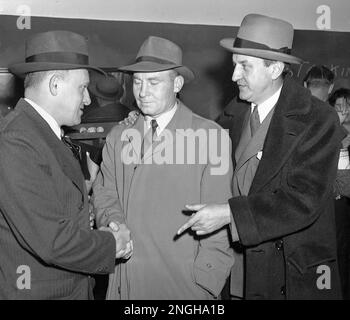 Delegates attend the annual meeting of the National Professional Football  League in New York, April 12, 1940. From left, front row: Charles W.  Bidwell, owner of Chicago Cardinals; Carl Storck, league president;